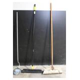 Large Assortment of Lawn and Garden Tools Including Rakes, Shovels, Hoes, and Brooms