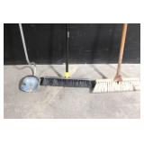 Large Assortment of Lawn and Garden Tools Including Rakes, Shovels, Hoes, and Brooms