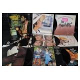 Collection of 9 Classic Vinyl Records including Joan Baez, Charley Pride, Blood Sweat & Tears, Bay City Rollers, and More