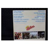 Collection of 9 Classic Vinyl Records including Joan Baez, Charley Pride, Blood Sweat & Tears, Bay City Rollers, and More