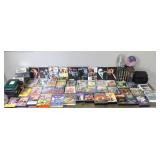 Lot of DVD Movies - VHS Tapes - Music CD’s - Music Cassette Tapes and 4 CD Cases