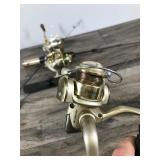 Lot of 4 Ice Fishing Rod & Reels with String and ready to go fishing
