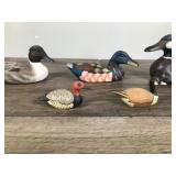 4 - Collectible Duck Figurines and 1 Canadian Goose