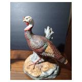 1980 W. D. Gaither Turkey Gobbler statue for National wild Turkey Federation and 1983 Austin Nichols Wild turkey and bobcat #2 liquor decanter and 1989 Ski Country Single Elk liquor decanter