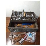 Vintage metal tool box full of tools
