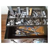 Vintage metal tool box full of tools