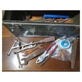 Vintage metal tool box full of tools