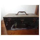 Vintage metal tool box full of tools
