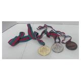 Three Special Olympics Metals Gold Silver and Bronze