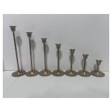 7 Graduated Brass Candle Sticks