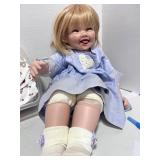 Jointed Bendable Porcelain Doll with Extra Outfits