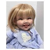 Jointed Bendable Porcelain Doll with Extra Outfits