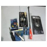 Pry tool, long reach pliers, magnet...