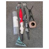 Mixed Household and Outdoor Lot with Yoga Mat, Rake, Umbrellas, Plant Pot, and Mercedes-Benz License Frame