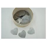 hat box full of metal hearts