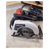 Cabinet with Power Tools, Circular Saws, Sanders, and Sandpaper Rolls