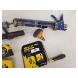 Mixed Lot of Caulking Guns, Tape Measures, Stanley Hand Saw, and Pneumatic Tools