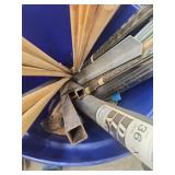 Large Blue Barrel with Assorted Metal Tubing, Rods, and Screening Material