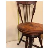 Antique Wood Piano Stool with Claw Feet and Ornate Backrest