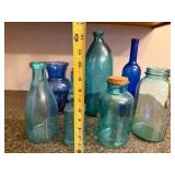 Collection of 7 Blue and Aqua Glass Bottles and Vases
