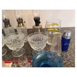 Collection of Vintage Glass Oil Lamps, Crystal Glassware, and Salt Shakers