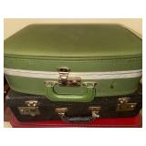 Collection of 4 Vintage Suitcases in Assorted Colors and Styles