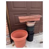 Collection of Assorted Outdoor Garden Pots and Planters