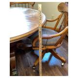 Wood Dining Table with 4 Rolling Chairs