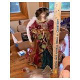 Assorted Collectibles: Porcelain Dolls, Glass Hen Dish, Birdhouse, and Decorative Figurines