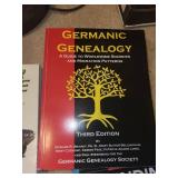 Book Collection with World Map - Muscle Cars, Genealogy, Founding Fathers, The Hooked X