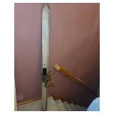 Antique Wooden Skis with Decorative Ribbon