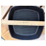 2 10-inch Cast Iron Griddles - 1 has blue enameled bottom