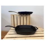 2 10-inch Cast Iron Griddles - 1 has blue enameled bottom