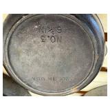3 Cast Iron Skillets - (1) 10 1/2 inch, (1) number 7 and (1) number 3 which is 6 5/8 inch