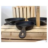 3 Cast Iron Skillets - (1) 10 1/2 inch, (1) number 7 and (1) number 3 which is 6 5/8 inch