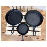 3 Cast Iron Skillets - (1) 10 1/2 inch, (1) number 7 and (1) number 3 which is 6 5/8 inch