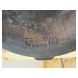 3 cast-iron pieces- corncob cornbread pan, serving skillet, and a flat round skillet