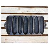 3 cast-iron pieces- corncob cornbread pan, serving skillet, and a flat round skillet