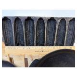 3 cast-iron pieces- corncob cornbread pan, serving skillet, and a flat round skillet