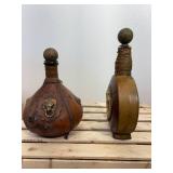 Two vintage Italian leather wrapped decanter bottles made in Italy