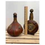 Two vintage Italian leather wrapped decanter bottles made in Italy