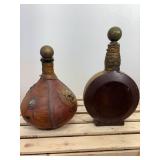 Two vintage Italian leather wrapped decanter bottles made in Italy