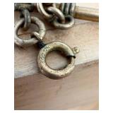 Working Hampden railroad pocket watch with engraved cabin motif