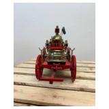 Working novelty radio modeled after the Mississippi 1869 horse drawn fire engine