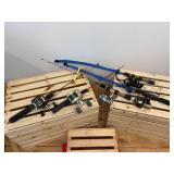 Five ice fishing poles with reels