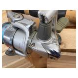 Five ice fishing poles with reels