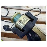 Five ice fishing poles with reels