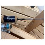 Five ice fishing poles with reels