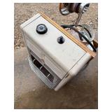 Homemade portable heating unit contains propane tank, Mr. sunny and attached furnace