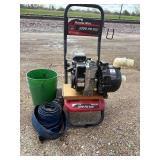 2200 psi pressure washer converted into a water pump and two pump hoses
